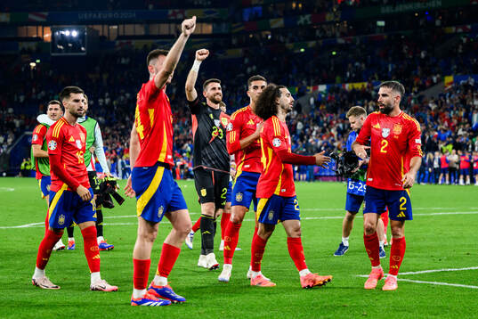 Goalkeeper Unai Simon Mendibil of Spain celebrates with