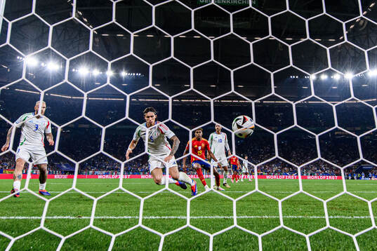 Riccardo Calafiori of Italy scores 1-0 own goal