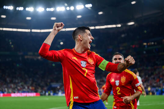 Alvaro Morata and Daniel Carvajal of Spain celebrate