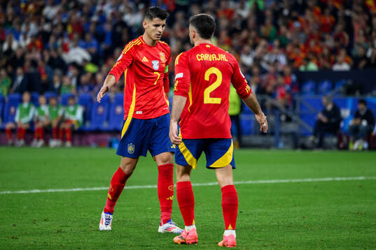 Alvaro Morata and Daniel Carvajal of Spain