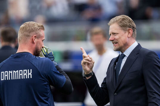 Goalkeeper Kasper Schmeichel of Denmark with father Peter