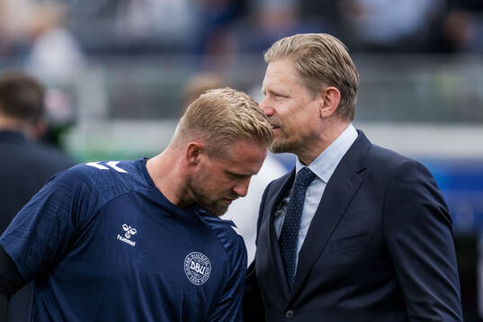 Goalkeeper Kasper Schmeichel of Denmark with father Peter