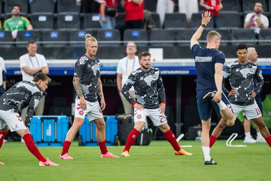Simon Kjær and Anders Dreyer of Denmark