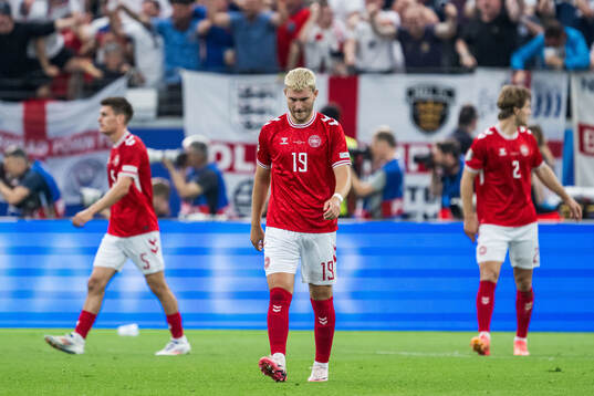 Jonas Wind of Denmark looks dejected