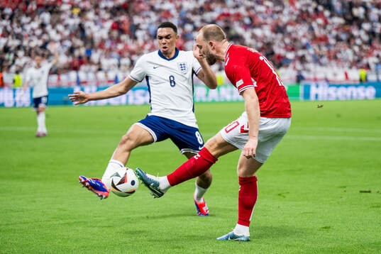Trent Alexander-Arnold of England and Christian Eriksen of
