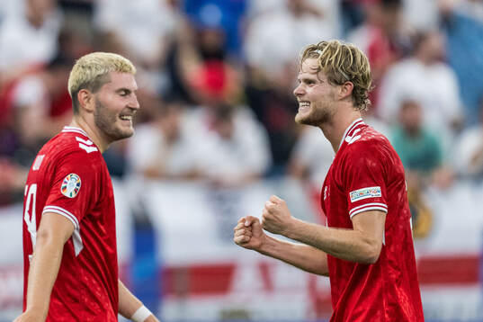 Morten Hjulmand of Denmark celebrates