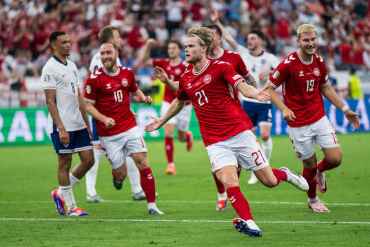 Morten Hjulmand of Denmark celebrates