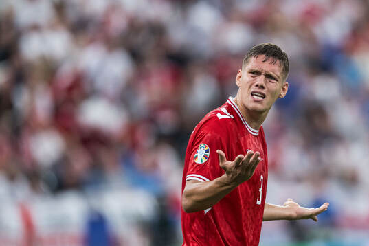 Jannik Vestergaard of Denmark reacts