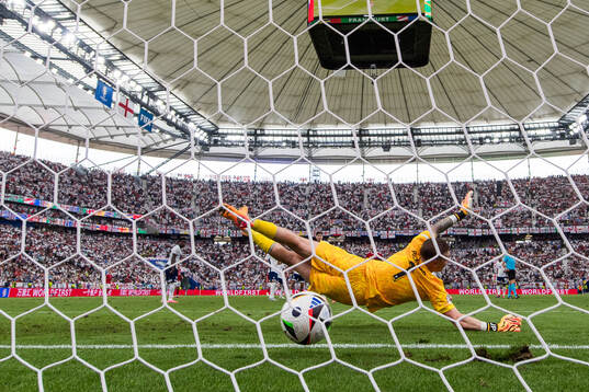 Morten Hjulmand of Denmark (not pictured) scores 1-1 behind