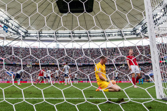 Goalkeeper Jordan Pickford of England looks dejected