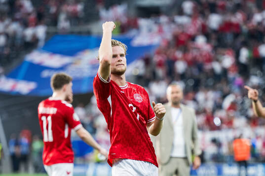 Morten Hjulmand of Denmark celebrates