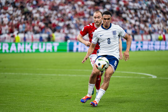Trent Alexander-Arnold of England and Christian Eriksen of