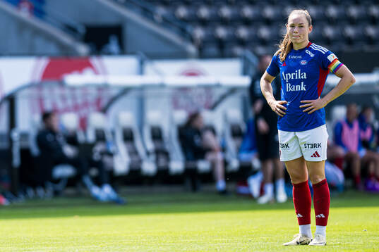 Janni Thomsen of Vålerenga looks dejected