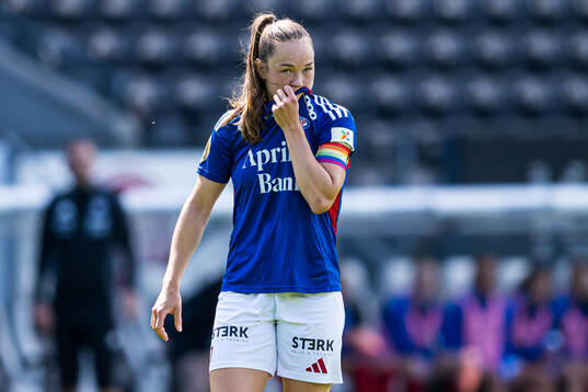 Janni Thomsen of Vålerenga looks dejected