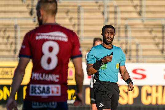 Domare Fredrik Oppong