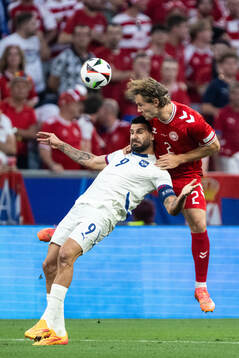 Aleksandar Mitrovic of Serbia and Joachim Christian