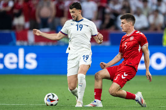 Lazar Vujadin Samardzic of Serbia and Joakim Mæhle of