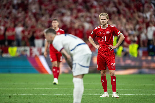 Morten Hjulmand of Denmark looks dejected