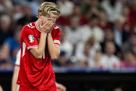 Morten Hjulmand of Denmark looks dejected