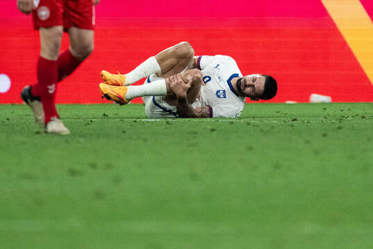 Aleksandar Mitrovic of Serbia in pain