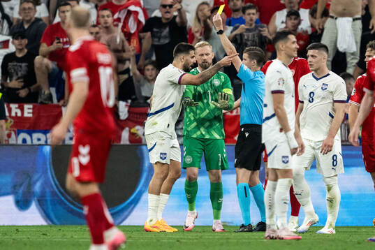Aleksandar Mitrovic of Serbia reacts towards referee