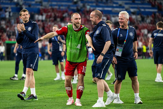 Christian Eriksen of Denmark celebrates