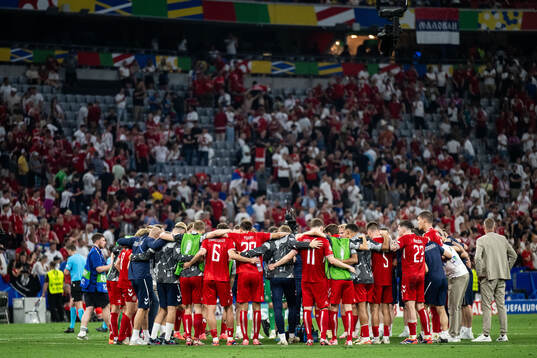 Players of Denmark gather