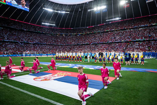 Players of Denmark and of Serbia