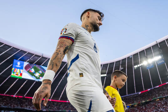 Nemanja Gudelj of Serbia enters the pitch