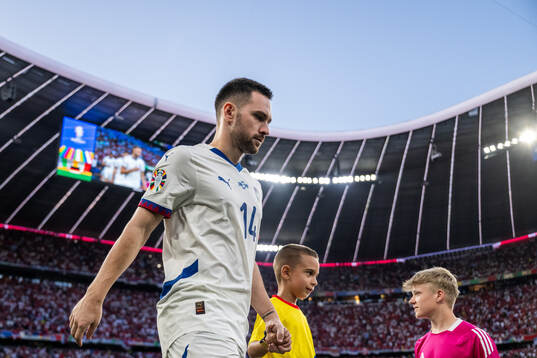 Andrija Zivkovic of Serbia enters the pitch