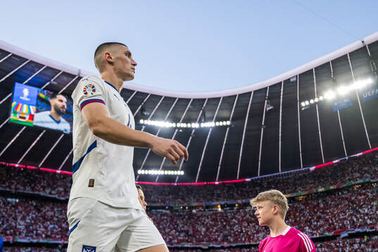Nikola Milenkovic of Serbia enters the pitch