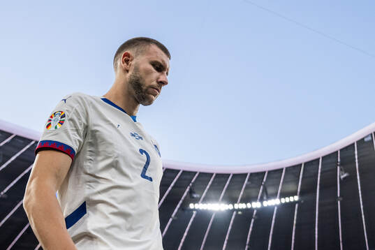 Strahinja Pavlovic of Serbia enters the pitch