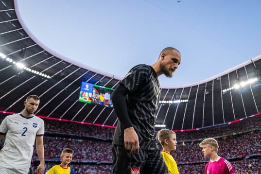Goalkeeper Predrag Rajkovic of Serbia enters the pitch