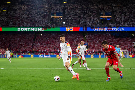 Kai Havertz of Germany and Andreas Christensen of Denmark