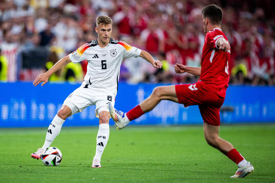 Joshua Kimmich of Germany and Joakim Mæhle of Denmark