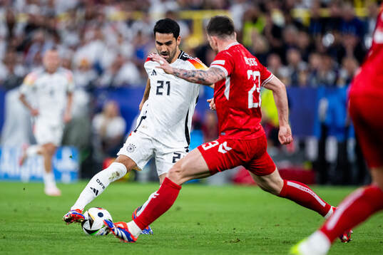 Ilkay Gundogan of Germany and Pierre-Emilie Højbjerg of