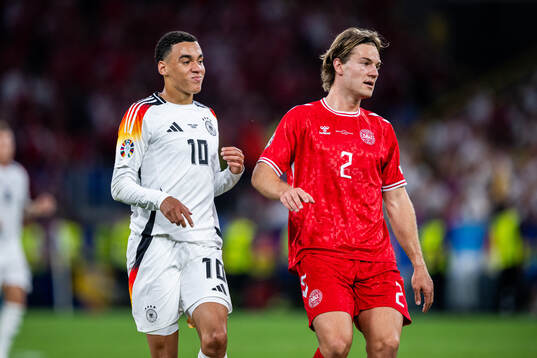 Jamal Musiala of Germany looks dejected
