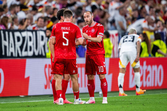 Christian Eriksen, Joakim Mæhle and Thomas Delaney of