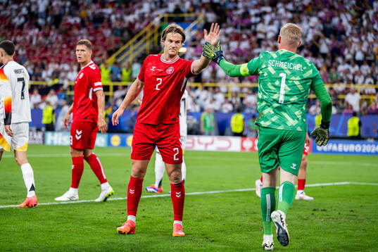 Joachim Andersen and goalkeeper Kasper Schmeichel of Denmark