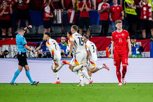 Andreas Skov Olsen of Denmark looks dejected