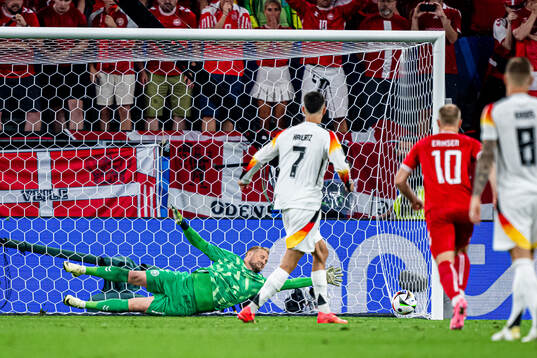 Kai Havertz of Germany scores 1-0 against goalkeeper Kasper