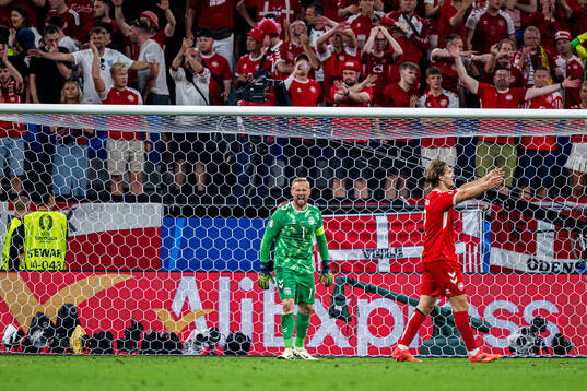 Goalkeeper Kasper Schmeichel of Denmark reacts