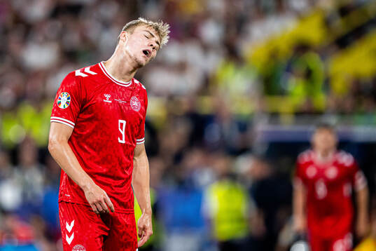 Rasmus Højlund of Denmark looks dejected
