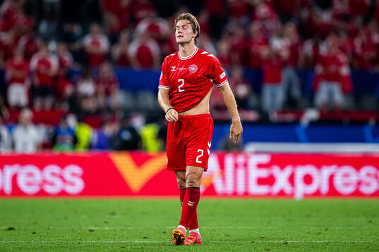 Joachim Andersen of Denmark looks dejected
