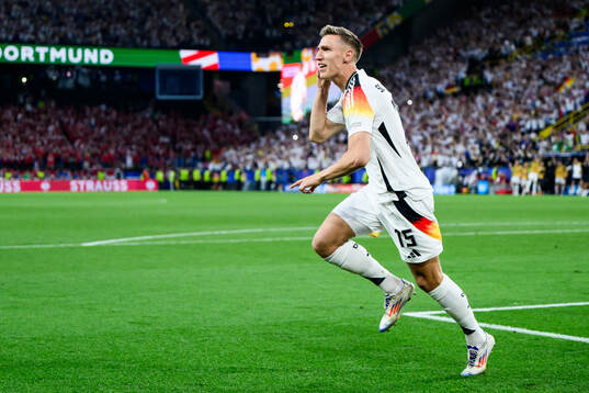 Nico Schlotterbeck of Germany celebrates