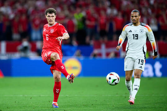 Andreas Christensen of Denmark and Leroy Sane of Germany