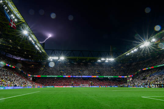 General view of BVB Stadion Dortmund as lightning strikes