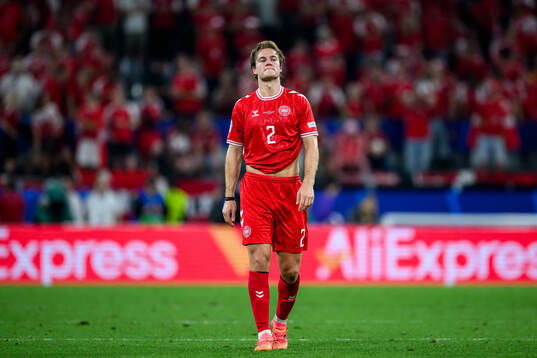Joachim Andersen of Denmark looks dejected
