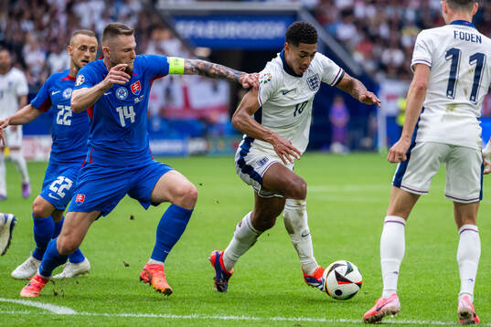 Milan Skriniar of Slovakia and Jude Bellingham of England