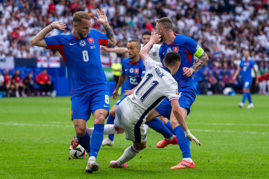 Ondrej Duda of Slovakia and Phil Foden of England